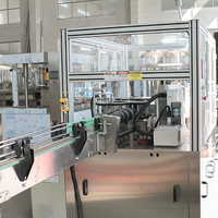 Machine d'étiquetage à colle thermofusible linéaire OPP pour bouteilles rondes
