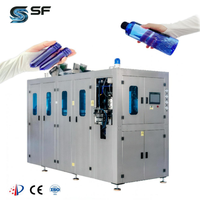 Machine de soufflage de bouteilles PET automatique à 2 cavités ShouFan haute vitesse 5500b/h avec moteur à roulement PLC Delta pour ligne de production d'eau minérale