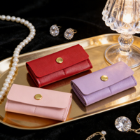Pochette à bijoux en cuir PU pliable, organiseur de voyage pour bagues, boucles d'oreilles et petits accessoires, étui à bijoux compact en cuir