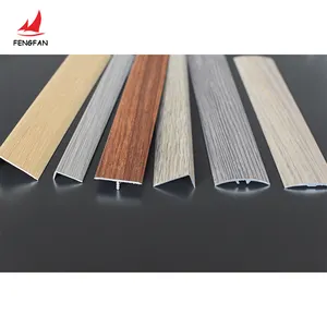 Eccellente rivestimento per pavimenti in legno con profilo di riduttore di transizione a venature in alluminio rivestimento per piastrelle decorativo per il bordo della scala fornitore