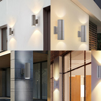 Applique murale LED extérieure moderne cylindrique bidirectionnelle étanche IP65 AC 85-265V 18W 12W 24W avec boîtier noir