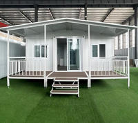Fabricant de maisons conteneurs pliables de luxe haut de gamme 20FT 40FT, maison préfabriquée extensible, villa modulaire 2-3 chambres