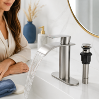 Robinet de lavabo élégant en acier inoxydable nickel brossé, à levier unique, avec bec cascade haut cylindrique et siphon escamotable