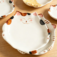 Nouvelles assiettes en céramique créatives en forme de chat Kawaii, assiettes à dessert irrégulières en céramique mignonnes de style dessin animé pour la maison et la restauration