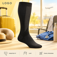 Chaussettes de compression noires à compression graduée pour le mollet, avec panneau extensible, pointe plate, manchette plus large, conformes à la tableau des tailles, vérifiées