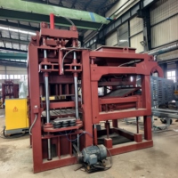 Machine à briques hydraulique entièrement automatique QT4-15 pour la fabrication de blocs creux et de pavés autobloquants, idéale pour les briqueteries