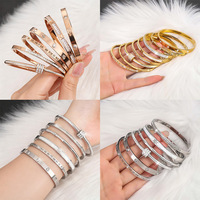 Bracelet en acier inoxydable serti de diamants haut de gamme personnalisé, logo OEM sur mesure