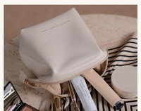 Nouvelle pochette cosmétique de luxe en cuir PU imperméable de marque personnalisée pour femmes de marque mini trousse de maquillage de voyage
