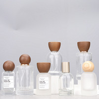 Flacon de parfum de luxe exquis de 50 ml avec bouchon en bois de noyer, portable, en verre rechargeable, idéal pour diffuseur