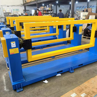 Positionneur rotatif industriel avec poutre en H orange et plateforme de base antidérapante pour le traitement de longues pièces