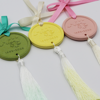 Vente en gros Diffuseur de pierre ronde suspendue personnalisé Diffuseur de pierre de plâtre écologique Désodorisant d'huile essentielle pour voitures