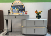Coiffeuse moderne extensible avec miroir incurvé, éclairage LED, miroir amovible, tiroirs ovales, en MDF durable
