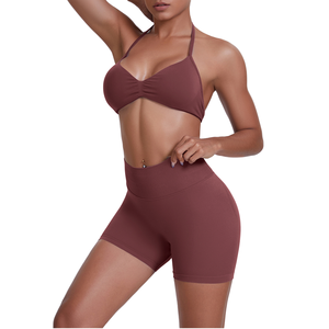 Conjunto de yoga para mujer: shorts de cintura alta efecto melocotón, top deportivo halter sin espalda, color liso, transpirable, ligero y elástico. - Product Image 1