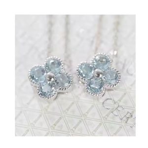 Collier pendentif trèfle à quatre feuilles porte-bonheur en or fin 18 carats avec pierre précieuse naturelle aigue-marine Xinfly Jewelry - Product Image 1