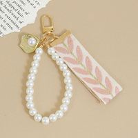 Porte-clés lumineux, cordon pour téléphone, design feuille, pendentif en perle, écouteurs, décoration de fête d'anniversaire, cadeau