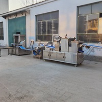 Ligne complète de production de pain automatique Machine à sandwich à pain de poche pita avec trancheuse à pain grillé pour la boulangerie