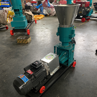 Machine à granulés d'aliments pour animaux, électrique, à trémie large, pour l'alimentation des bovins et des ovins, idéale pour les petites exploitations agricoles, compacte et conviviale pour l'utilisation.