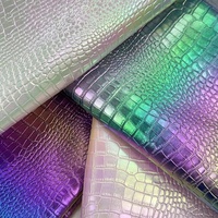 Tissu en vinyle PVC imitation cuir holographique métallique arc-en-ciel gaufré crocodile de 0,8 mm pour la fabrication de chaussures, de sacs et de boucles d'oreilles