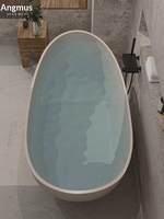 Baignoire artistique en travertin de style Wabi-Sabi, en pierre artificielle, autoportante, élégante, en forme d'œuf, pour maison, hôtel, B&B