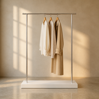 Porte-vêtements autoportant en acier inoxydable chromé avec base en dalle solide blanche, présentoir de vêtements pour la vente au détail, taille personnalisée