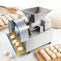 Machine automatique de division et de façonnage de boulettes de pâte pour la production de pains vapeur en boulangerie