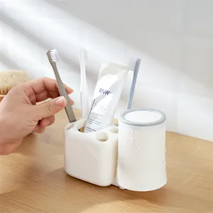 Creative Japanese toothbrush holder mouthwash cup holder porous dental holder