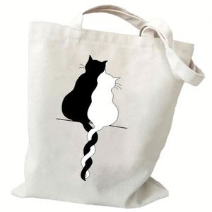 Sacs à main en toile réutilisables de 12 oz avec imprimé chats blancs et noirs, sacs de courses quotidiens en gros - Product Image 1