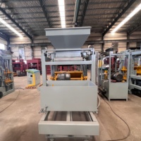 Équipement de moulage de blocs QT4-15 avec une structure durable pour une utilisation à long terme