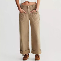 Jeans en denim délavé rétro décontractés à jambe droite pour femmes Nouveau style de rue à jambe large à la mode avec logo à la taille