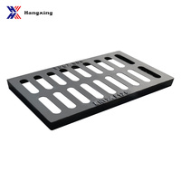 Grille de drainage en fonte ductile de qualité supérieure, solutions de couvercles de tranchées, services de fonderie de pointe, modèle Hangxing 400*600 CN/SHN