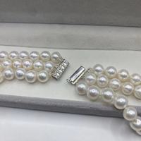 Collier de perles d'eau douce, taille uniforme, lisses, brillantes, polies, lueur laiteuse, scintillantes, esthétiques, élégantes, délicates, féminines, ivoire