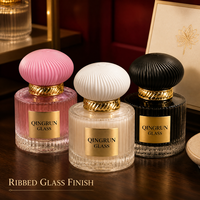 Flacon de parfum en verre cylindrique vide de 40 ml avec design à rayures verticales et étiquette personnalisée