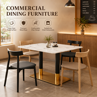 Ensemble de salle à manger, surface en pierre frittée blanche avec colonne à revêtement noir et doré, idéal pour les cafés, restaurants, zones alimentaires et salles de jeux modernes