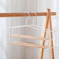 Cintre à pantalons multi-niveaux en métal et fer avec barres rondes en bois pour armoire et séchage du linge