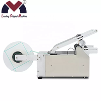 Étiqueteuse manuelle simple autocollant adhésif de bouteille ronde avec poignée étiqueteuse bouteille de vin petite machine d'emballage