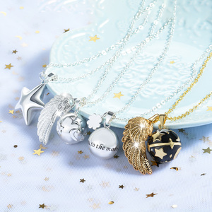 Commercio all'ingrosso di <span class=keywords><strong>Oro</strong></span> Nero di Luna Stella Bola Messicano Dello Smalto Vernice <span class=keywords><strong>Angelo</strong></span> Chime <span class=keywords><strong>Collana</strong></span> Per Il Bambino Madre - Product Image 2