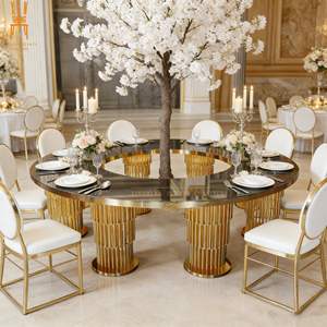 Tavolo da Pranzo di Lusso con Piano in Vetro Rotondo e Base a Colonna in Acciaio Inox Dorato per Banchetti in Hotel ed Eventi Nuziali - Product Image 1