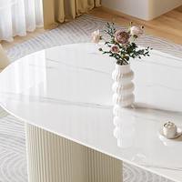 Ensemble de table à manger élégante avec plateau en pierre frittée blanche ovale et double piédestal - Parfait pour la cuisine et la salle à manger à la maison