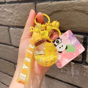 Porte-clés créatif et mignon Panda, Grenouille, Ours, Boba, ou Tasse de thé au lait, rempli de liquide et de billes flottantes, avec ampoule intégrée - Product Image 3