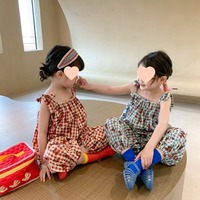 Nouvelles filles printemps/été 2024 pantalons combinaison à lacets à carreaux floraux pour usine directe personnalisée