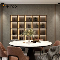 Système d'armoires murales Melinco sur mesure, même couleur, solution tout-en-un pour chambre principale, dressing, armoire de rangement