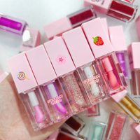 Huile pour les lèvres de marque privée avec pompon 48 saveurs au choix hydratant grand pinceau brillant à lèvres maquillage en gros huile dodue pour les lèvres