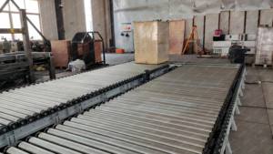 Línea transportadora de rodillos vivos impulsada por <span class=keywords><strong>cadena</strong></span> de manipulación de palés europeos de producción automática de servicio pesado para un transporte eficiente - Product Image 4