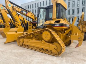 รถดันดิน CAT D5M XL มือสอง ใช้งานง่าย แข็งแกร่ง เหมาะสำหรับงานก่อสร้าง ปรับระดับพื้นดิน และเตรียมพื้นที่ - Product Image 1