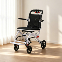 Fauteuil roulant de voyage pliable et portable, chaise de transport compacte avec frein à main pour l'aéroport, les courses et l'utilisation quotidienne en extérieur