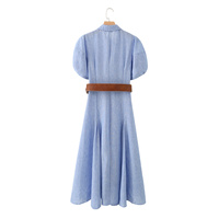 Robe midi décontractée et élégante pour femme, nouvelle collection 2026, avec col à revers, ceinture décorative, style rétro chic et manches bouffantes.