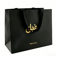 Boîte à parfum magnétique noire personnalisée de luxe, recyclable, en papier rigide certifié, avec insert pour 3 flacons vaporisateurs, finition dorée mate.