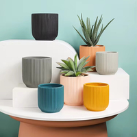 Pot de fleurs décoratif moderne pour la maison, en céramique, en forme de tasse à thé, à motif rayé créatif, pour plantes de bureau ou de jardin