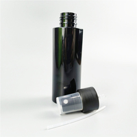 Empty100ml Bouteille de pulvérisation de brouillard Bouteilles de pulvérisateur en plastique rondes noires mates pour cosmétique