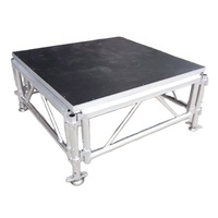 Pieds de scène réglables planche antidérapante noire plate-forme de scène en alliage d'aluminium pour mariage/spectacle en plein air à vendre